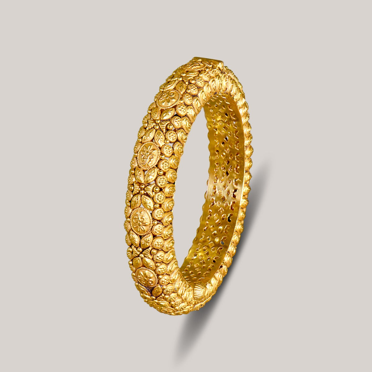 Round and Oval Motifs Gold Bangle