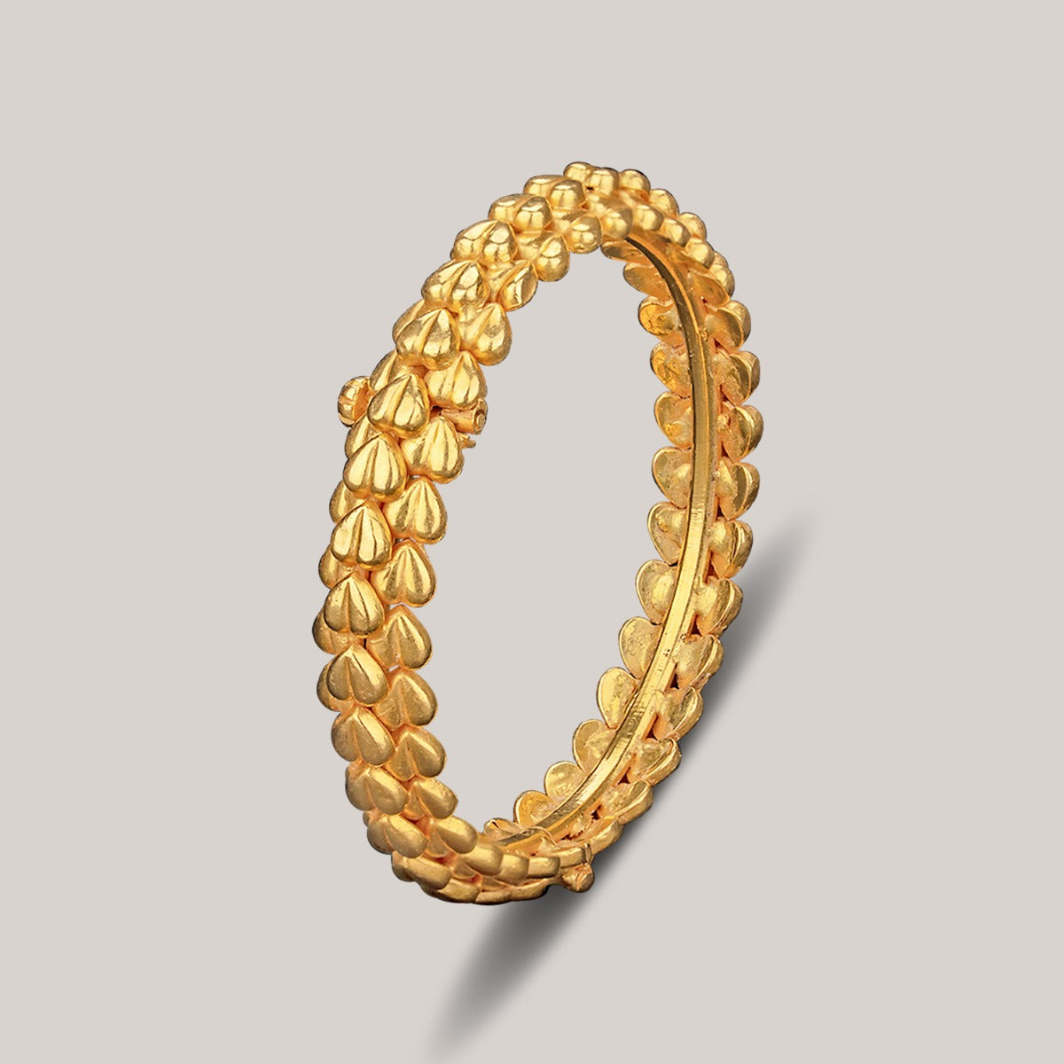 Hearts Lined Up Gold Bangle