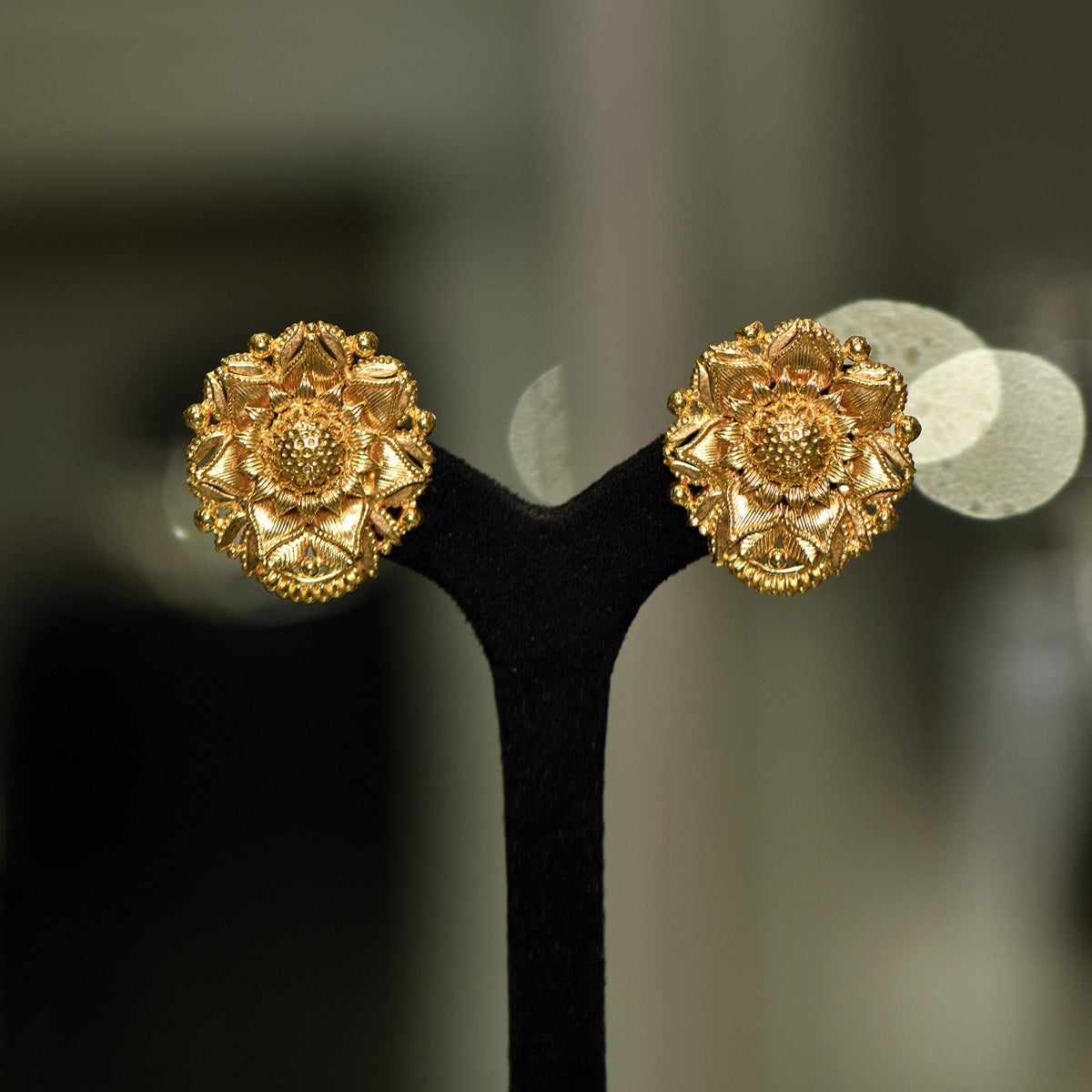 Bent Bounded Gold Earrings