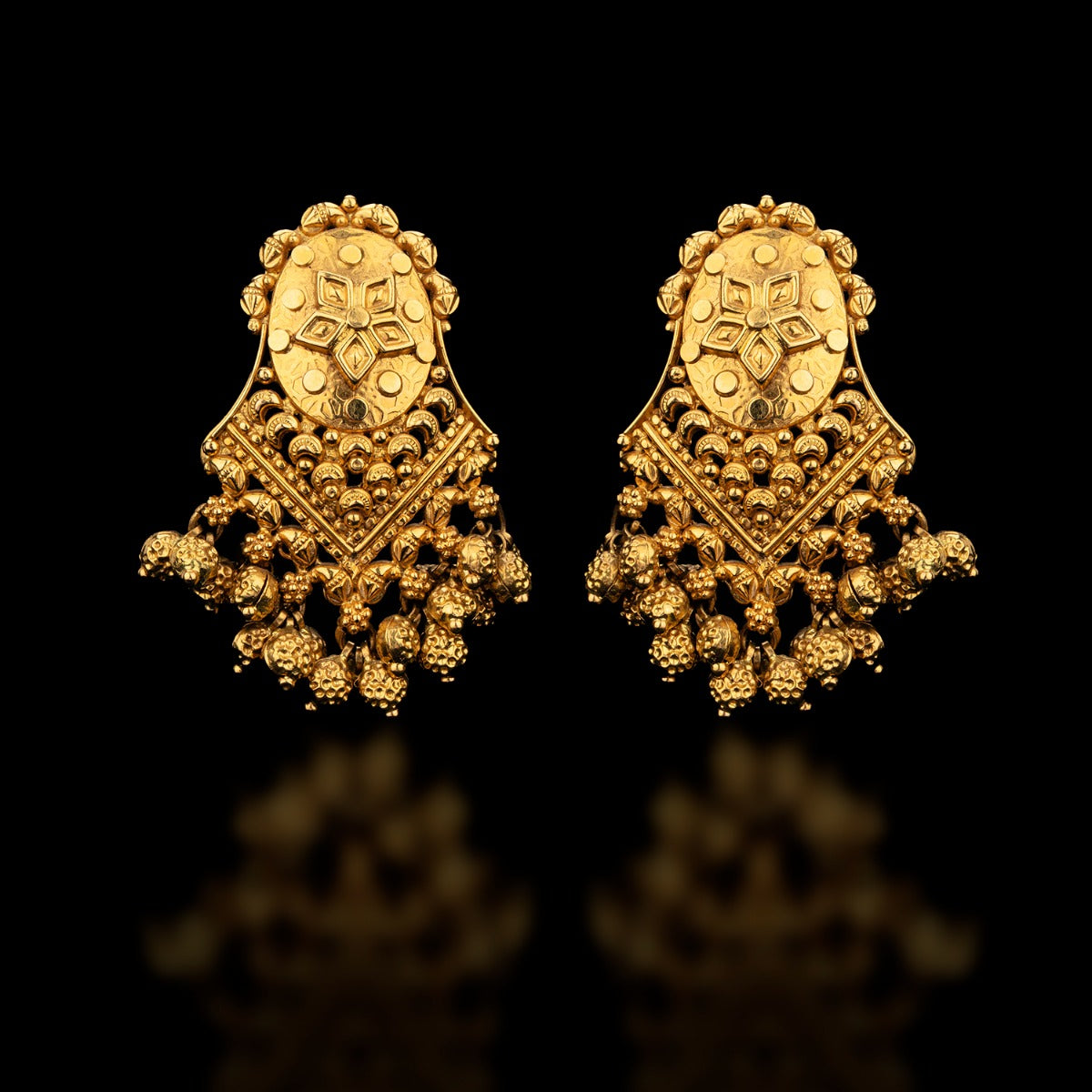 Oval Carved Gold Earrings