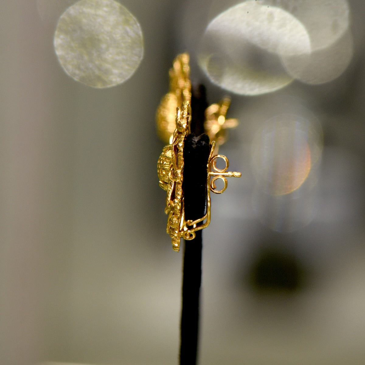 Bent Bounded Gold Earrings